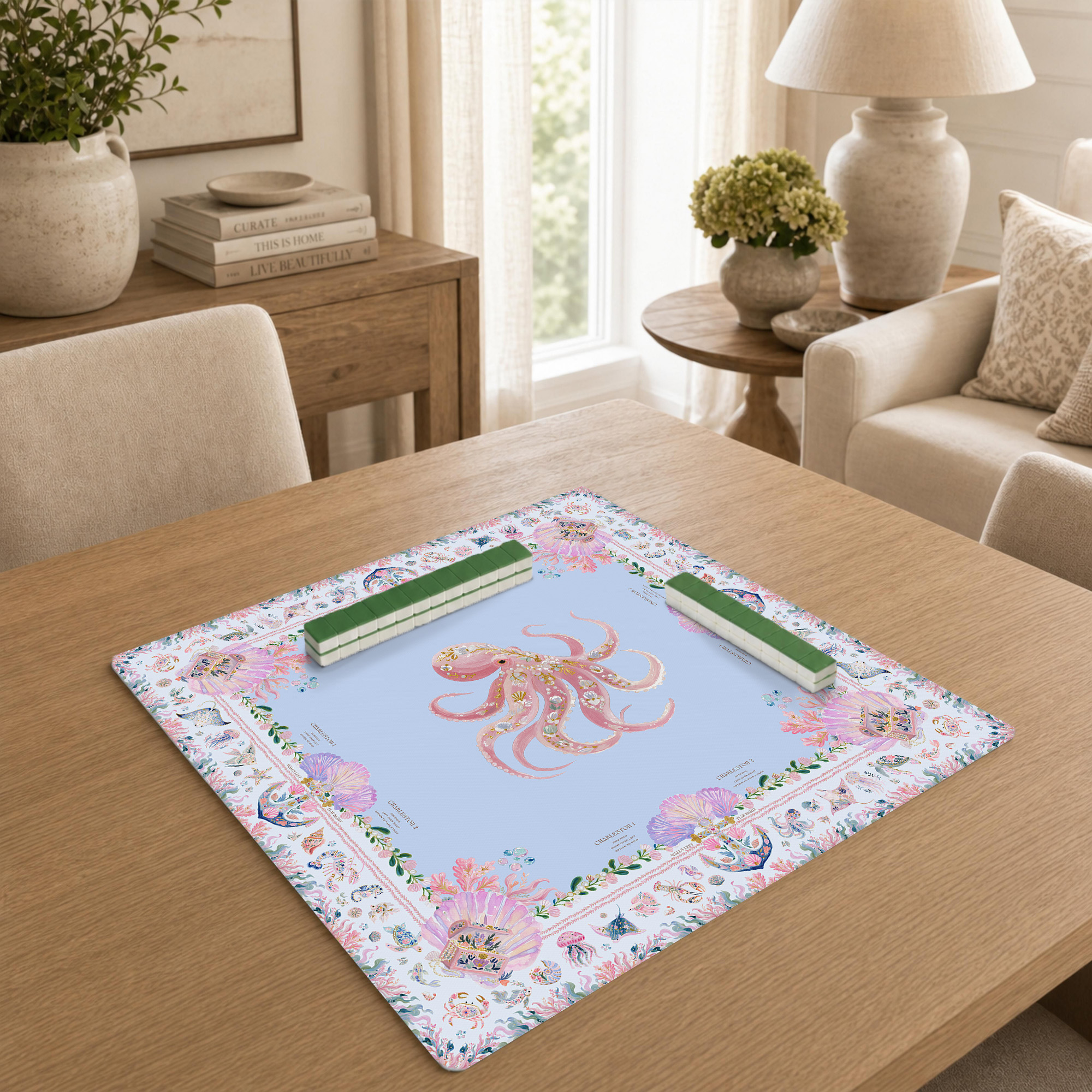 Four mahjong walls pushed together into a square on a printed mat